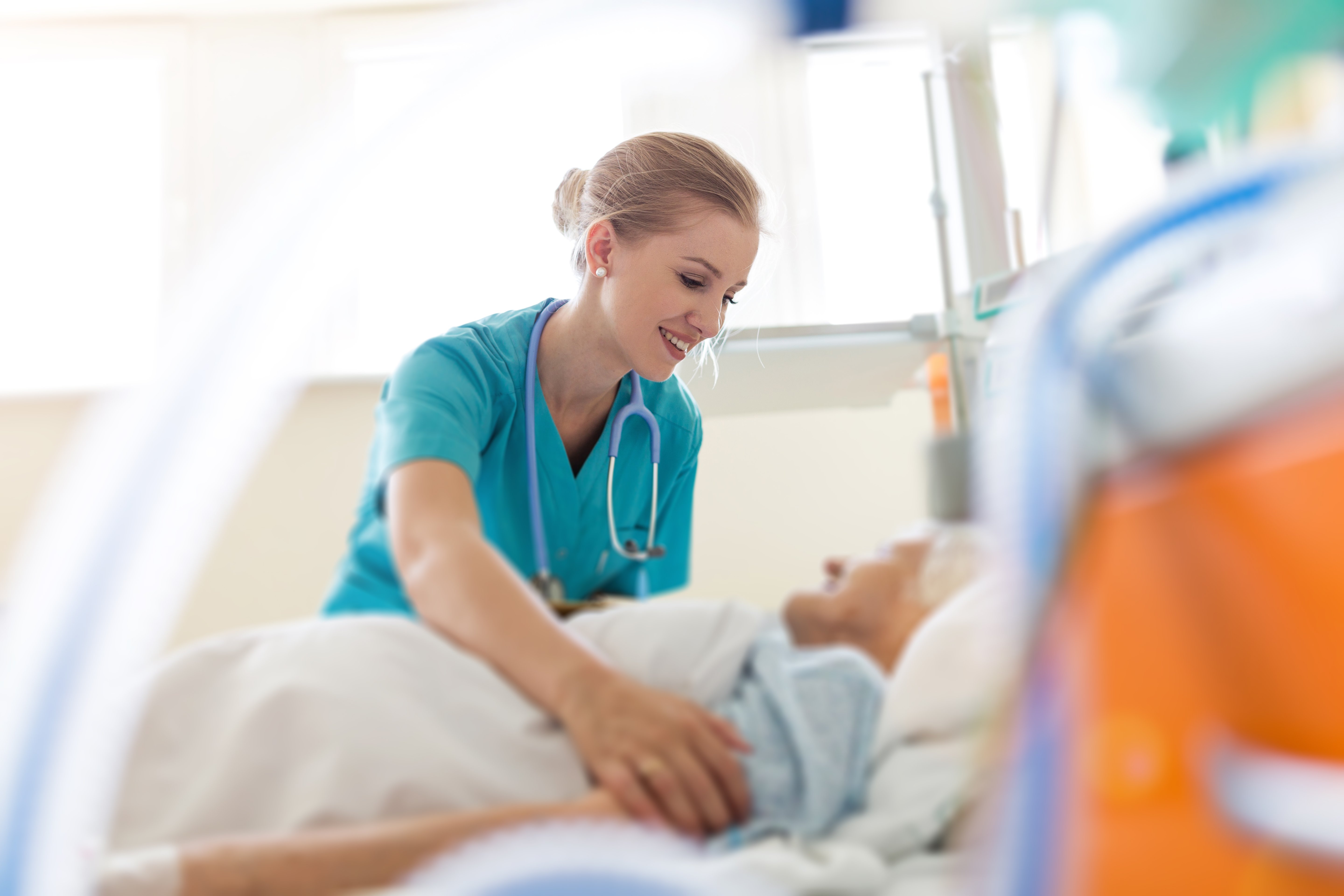 FemaleNurseTalkingToPatient-3